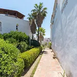 Benalmadena: adosado con piscina y jardin